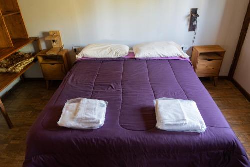 Letto o letti in una camera di Lupulito Lodge Cabañas de Montaña