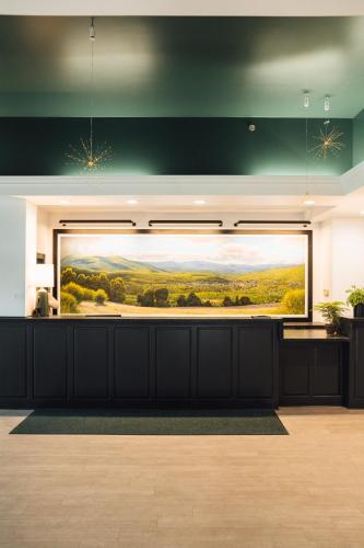 a large painting on the wall in a room at Hotel Downstreet, an Ascend Collection Hotel in North Adams