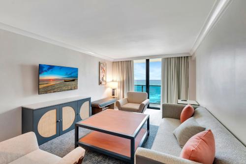 Posezení v ubytování Tideline Palm Beach Ocean Resort and Spa
