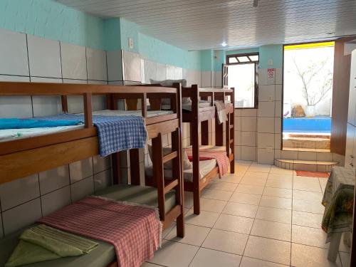 Двухъярусная кровать или двухъярусные кровати в номере A Casa dos Mestres