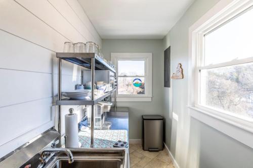 a kitchen with a sink and a window at The Loft at Hebron Valley Overlook in Madison