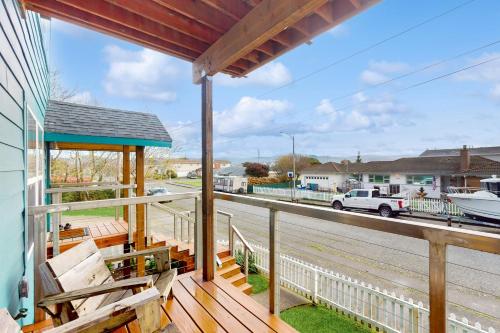 a porch with a view of a street at This Is It in Crescent City