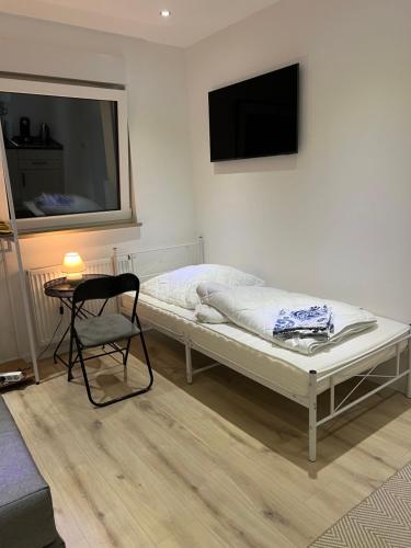 Postel nebo postele na pokoji v ubytování Hürth/Köln Gästewohnung