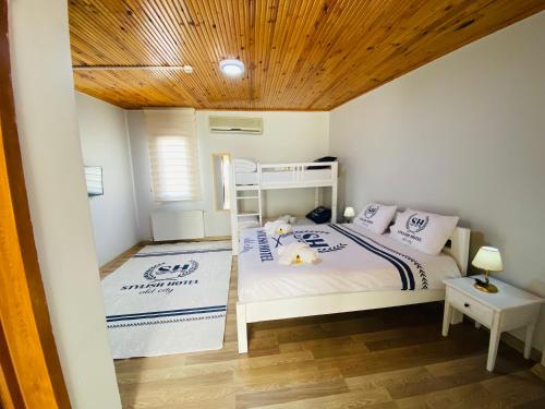 a bedroom with a bunk bed with a ladder at Stylish Hotel Old City in Istanbul