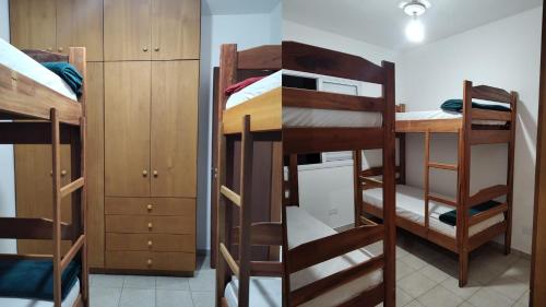 Tempat tidur susun dalam kamar di Apartamento no Centro de Ubatuba