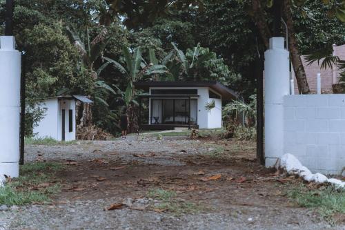 a house with a gate in front of it at Natura Bungalows in Fortuna