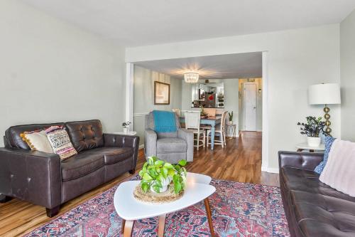 a living room with a couch and a table at Harbor Island E204 in Oceanmarsh Subdivision