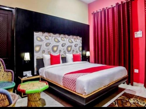 Cama o camas de una habitación en OYO Hotel Maa Tripura Residency