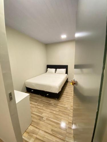 Cama o camas de una habitación en Apartamento entero en Caacupé.