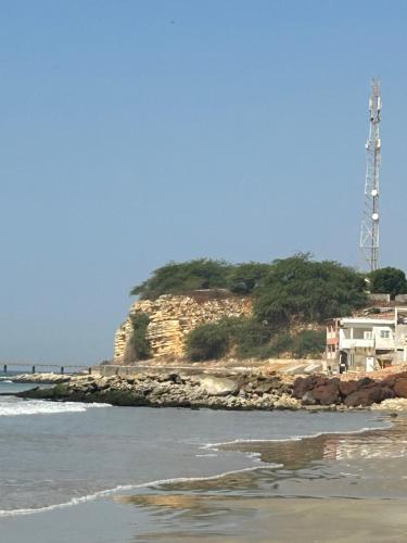 a house on the shore of a beach at Zarafah in Poponguine