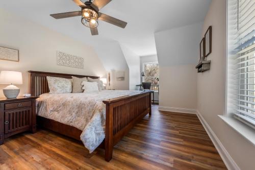 a bedroom with a bed and a ceiling fan at Charming Murphy House with Deck and River Views! in Murphy