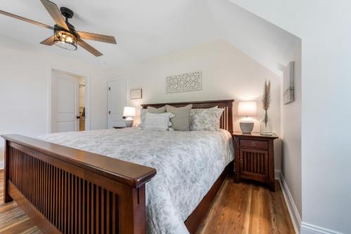 a bedroom with a bed and a ceiling fan at Charming Murphy House with Deck and River Views! in Murphy