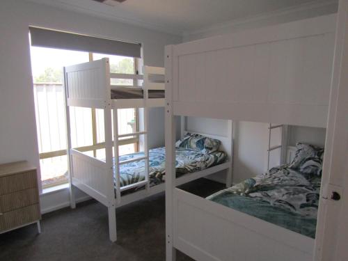 Ένα ή περισσότερα κρεβάτια σε δωμάτιο στο Robertsons Rest