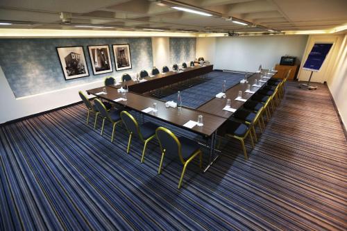 a large conference room with a long table and chairs at Radisson Blu Hotel, Beirut Verdun in Beirut