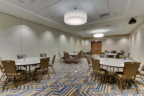 a conference room with tables and chairs in it at Drury Inn & Suites Lafayette IN in Lafayette