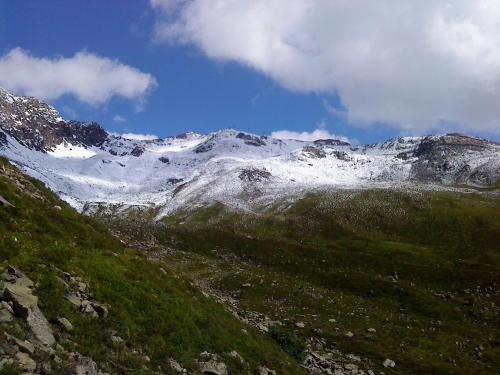 a mountain with snow on top of it at Haus Mattle in Pettneu am Arlberg
