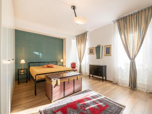 Katil atau katil-katil dalam bilik di Belvilla by OYO Appartamento su tre piani in paese