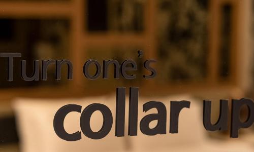 a glass window with the words turn ones colar up at Pohang A1 Hotel Yeongildae Branch in Pohang