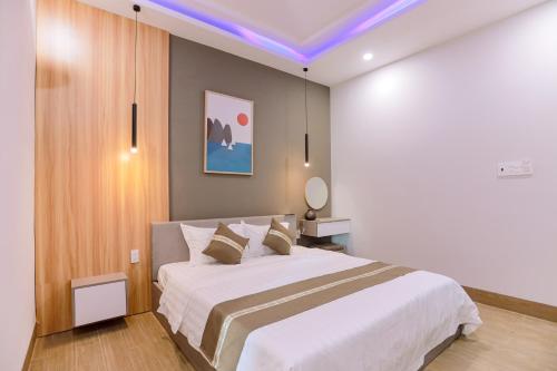 Ένα ή περισσότερα κρεβάτια σε δωμάτιο στο Every Day Guest House - Phan Thiet