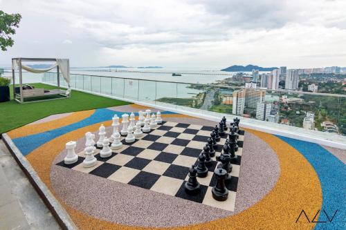 a chess board on the roof of a building at Urban Suites, Signature Collection by Stellar ALV in Jelutong