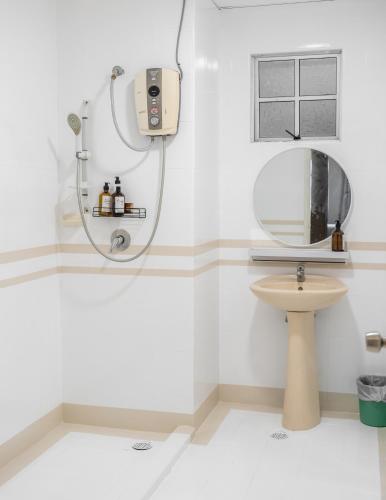 a bathroom with a shower and a sink at Star Regency by Plush in Brinchang