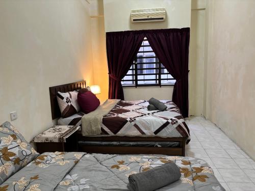 Katil atau katil-katil dalam bilik di Sofea Inn Bukit Merah - Laketown A6116