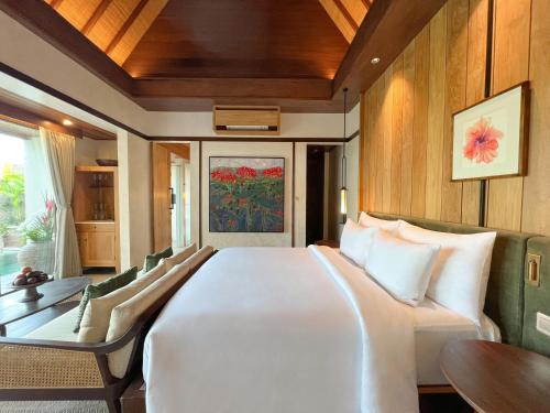 Кровать или кровати в номере The Ridge Bali