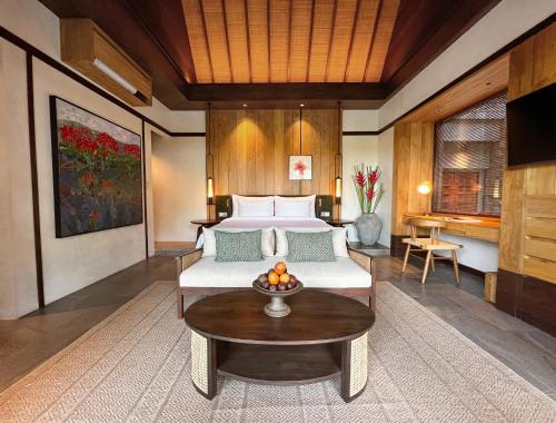 Телевизор и/или развлекательный центр в The Ridge Bali
