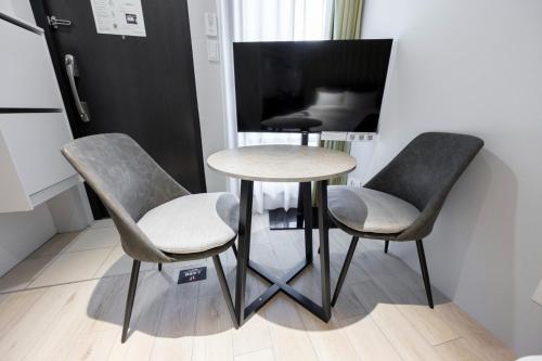 TV a/nebo společenská místnost v ubytování Repure Hikifune Residence II