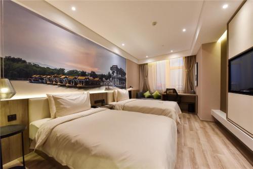 Postel nebo postele na pokoji v ubytování Atour Hotel Headquarter Base Beijing