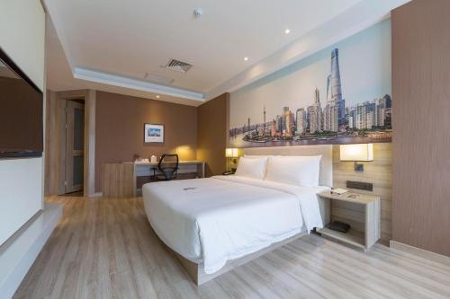 Cama o camas de una habitación en Atour Hotel Shanghai Xinzhuang