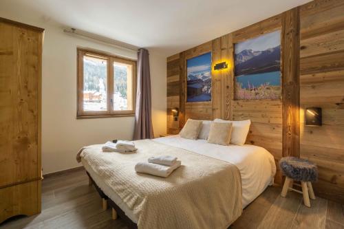 Ένα ή περισσότερα κρεβάτια σε δωμάτιο στο Chalet L'arcelle, Spa privée