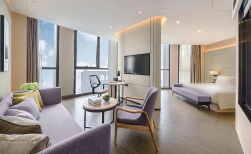 Postel nebo postele na pokoji v ubytování Atour Hotel Furong Middle Road Changsha