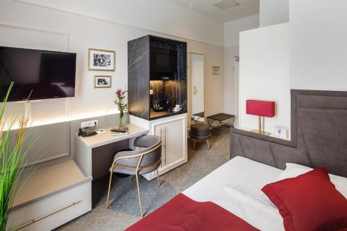 Televisyen dan/atau pusat hiburan di Star-Apart Hansa Hotel