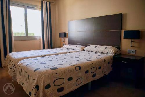 Postel nebo postele na pokoji v ubytování Albir Palace