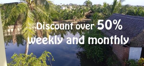 a sign that reads descendent over weekly andmonthly at Lakeview Villa Homestay in Hoi An