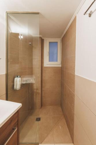 Ένα μπάνιο στο Jazzy condo near Proskopon square