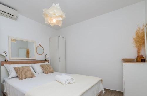 Postel nebo postele na pokoji v ubytování Holiday Home Nona