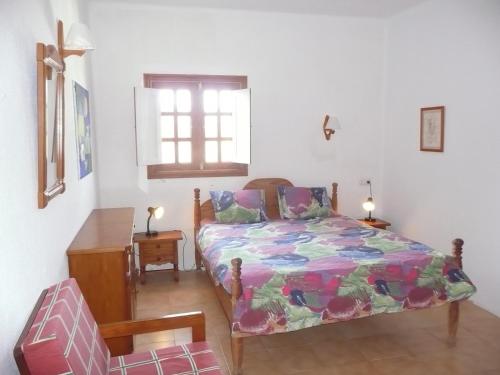 A bed or beds in a room at Casa Andrés