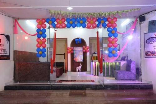 a room with a bunch of balloons in a room at Hotel Kumkum Chhaya in Panna
