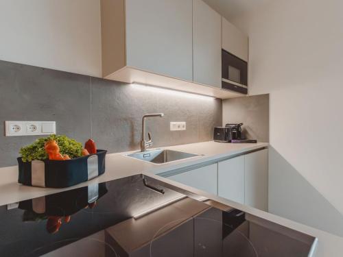 Kuchyňa alebo kuchynka v ubytovaní Apartment Das Georgen- Maiskogel by Interhome