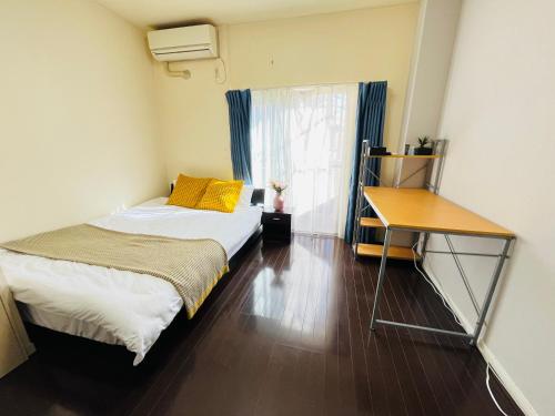 Postel nebo postele na pokoji v ubytování 20mins Direct to Ueno 21mins to Ikebukuro Max for 3 peole Nishikawaguchi302