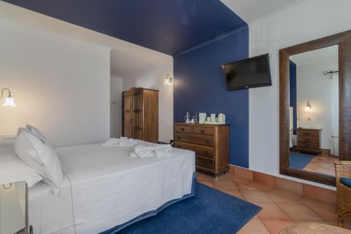 Charming Residence & Guest House Dom Manuel I Adults onlyにあるベッド
