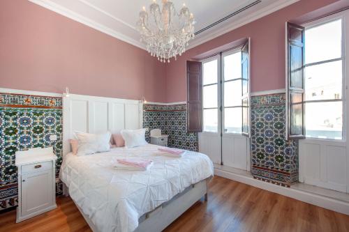 Ένα ή περισσότερα κρεβάτια σε δωμάτιο στο Casa Verde Ayamonte