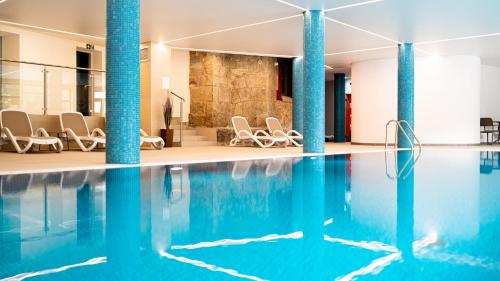 Bazén v ubytování Apartamenty z basenem i saunami ROYAL APARTS VIP Stone Hill II Centrum nebo v jeho okolí