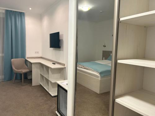 Ένα ή περισσότερα κρεβάτια σε δωμάτιο στο Danelis Hotel