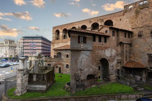 an old building on the side of a street at River61 - Guest House in Rome