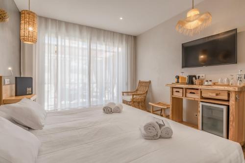Charming Residence & Guest House Dom Manuel I Adults onlyにあるベッド