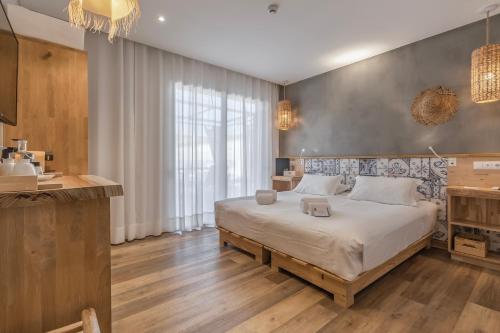 Charming Residence & Guest House Dom Manuel I Adults onlyにあるベッド