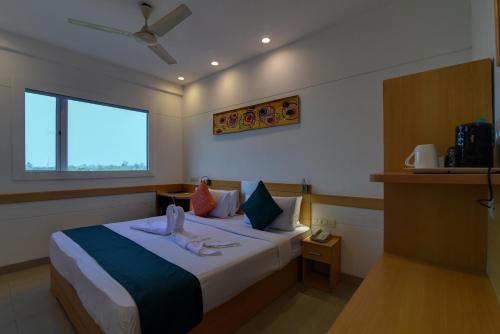 Mango Grove Hotelにあるベッド